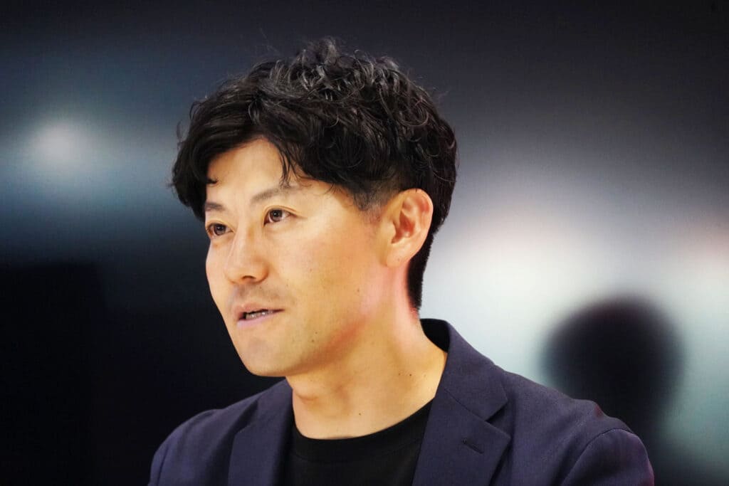 真剣な表情で質問に答える池田巧氏